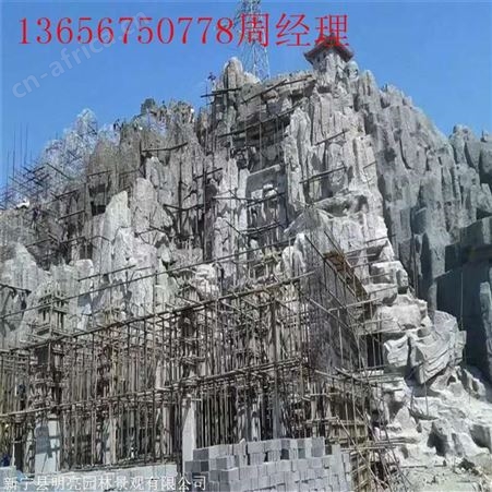 淮北市水池瀑布假山塑石 湘岩园林生态农庄假山假树制作 欢迎咨询